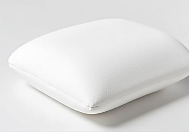 Firm memory foam pillow with ergonomic neck contour
